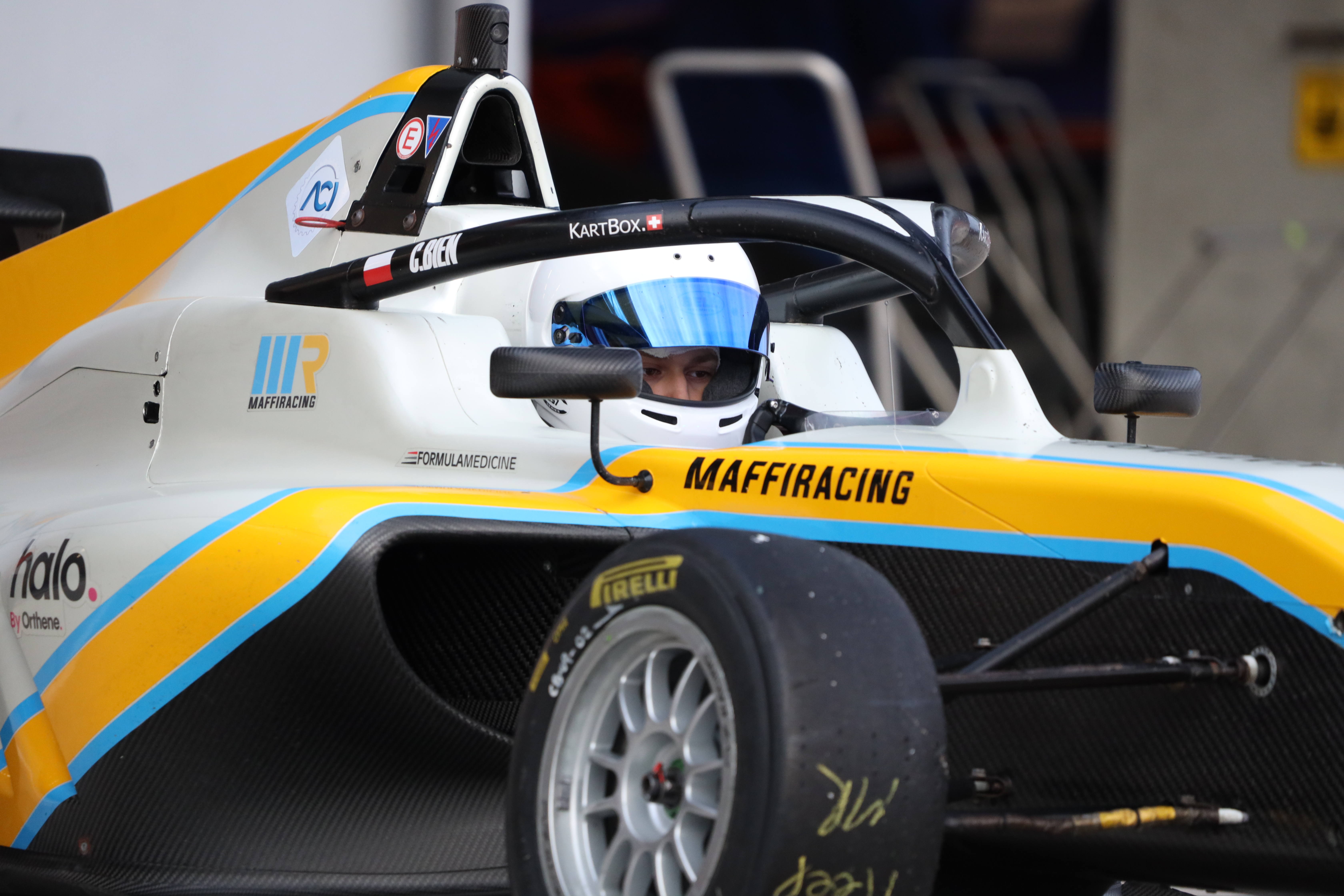 Cezary Bien testing a Formula 4 car and reviewing telemetry